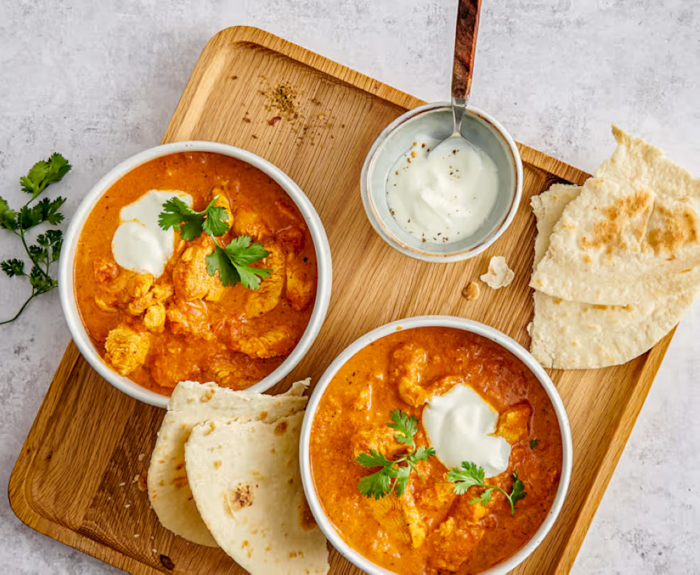A rich and indulgent dish that blends tender chicken with a silky smooth, tomato-based gravy, perfect for those who love creamy, flavorful curries